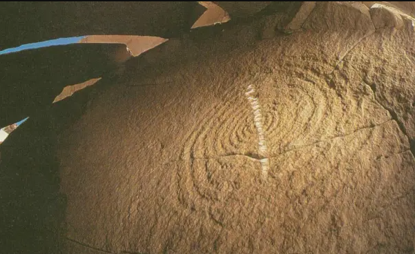 The ancient Sun Dagger, a petroglyph found atop the Fajita Butte at Chaco Canyon, New Mexico, marks the June Solstice with a spear of light.